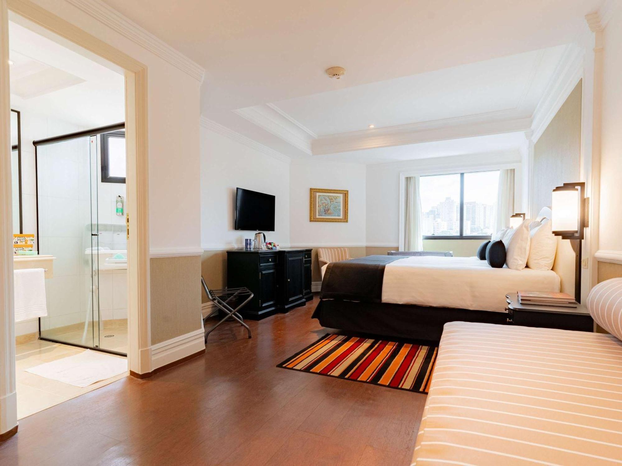 Grand Mercure Sao Paulo Ibirapuera Bagian luar foto A suite at the hotel
