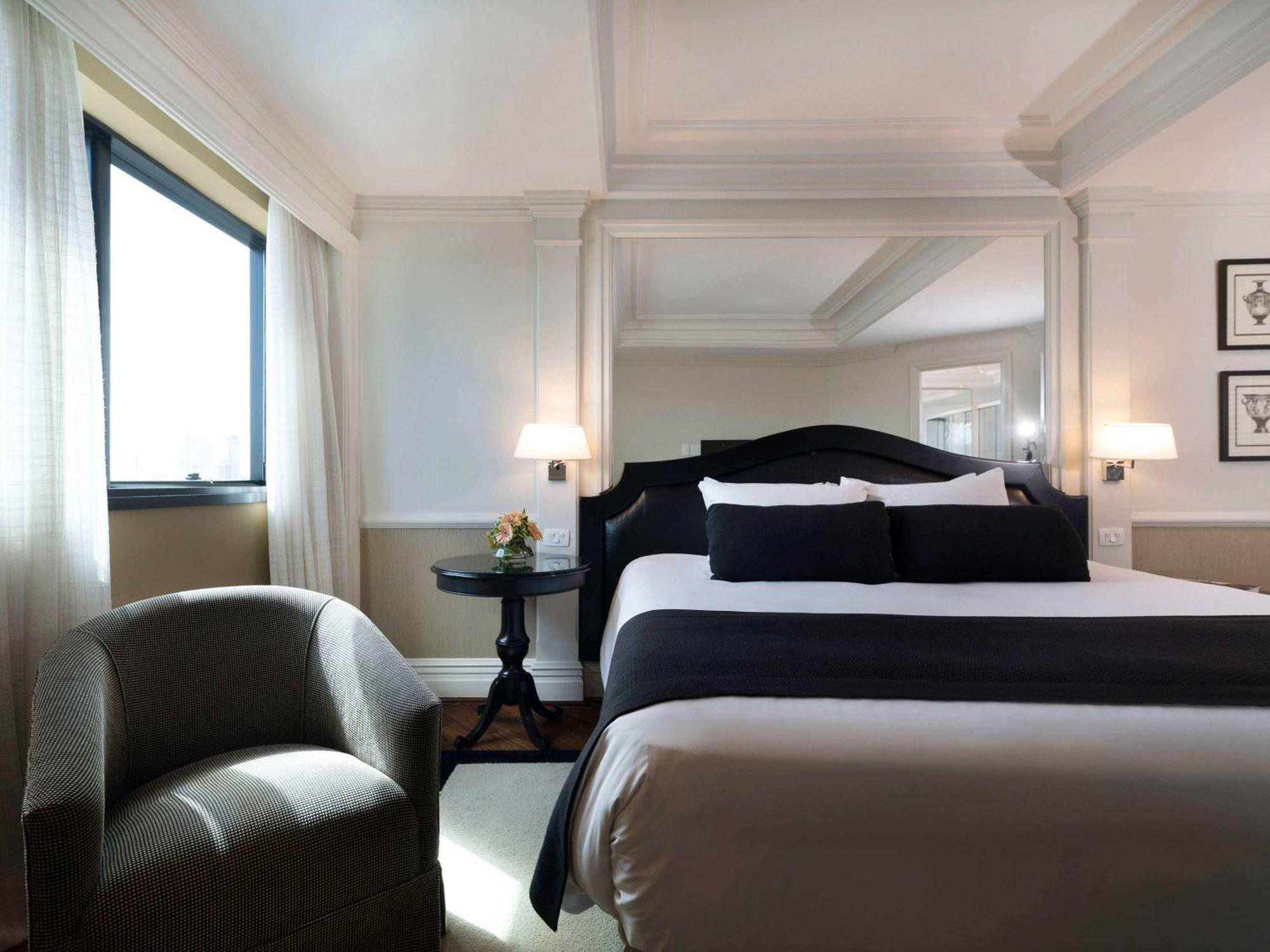 Grand Mercure Sao Paulo Ibirapuera Bagian luar foto A bedroom at the hotel